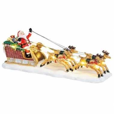 Kerstbeeldjes / kerstbeelden kerstman in slee met licht 17 cm kerstversiering