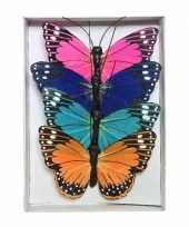 4x gekleurde vlinders op draad 9 cm versiering